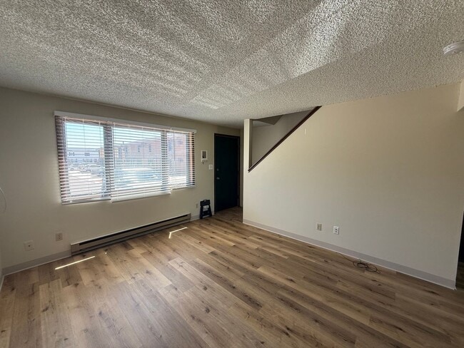 Building Photo - Two Bedroom, One and half bath townhome close to Regional West Medical Center.