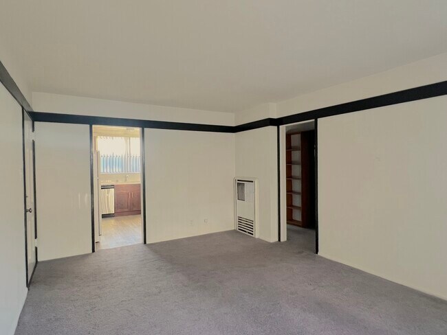 Living room to kitchen and hall - 13128 1/4 Valleyheart Dr