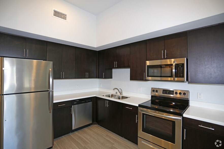 3BR, 2BA - 975 SF - Coastal Village Apartments