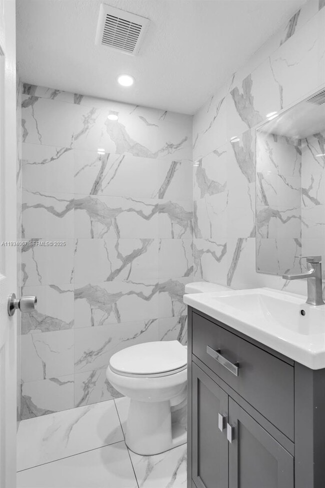 Building Photo - 5061 W 12th Ln