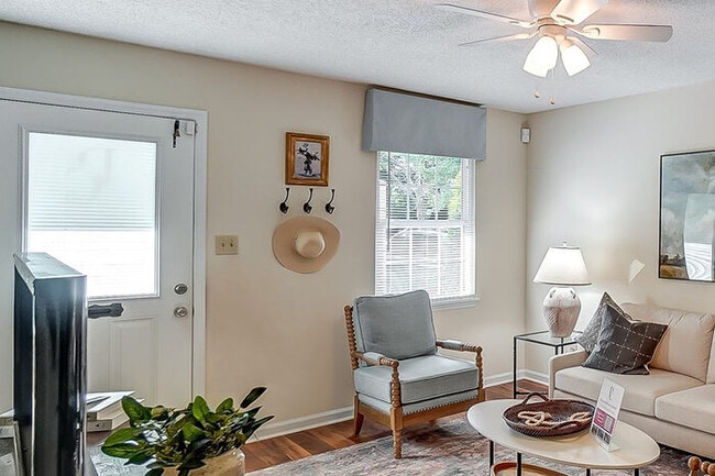 Building Photo - All-brick townhome living, minutes from it all.