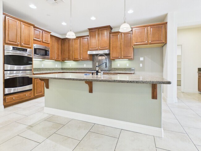 Building Photo - Spacious 5-Bedroom Solar Home in Blackstone with Resort Style Amenities