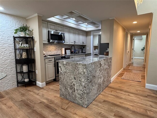 Building Photo - 6861 Woodwind Dr
