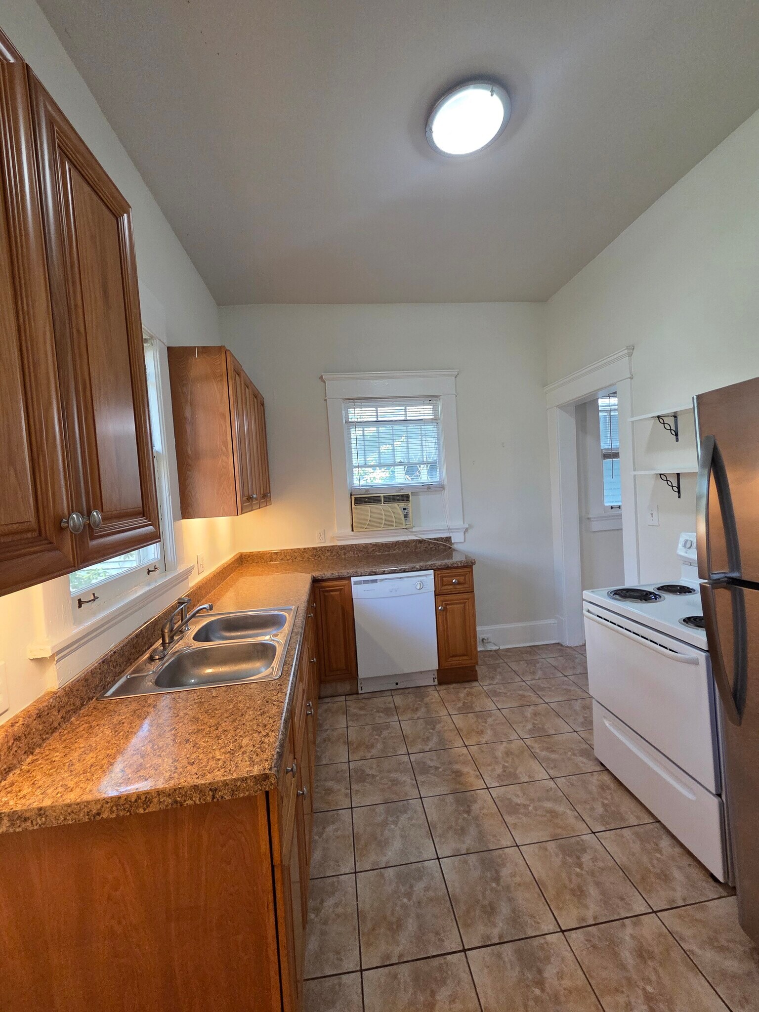 Kitchen with lots of cabinets and countertops - 974 N Highland Ave NE
