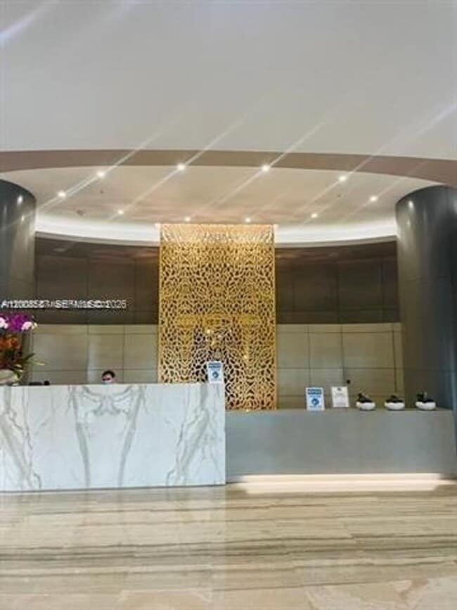 Building Photo - 10275 Collins Ave