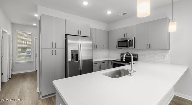 Building Photo - 8067 Purchase Ne Pl