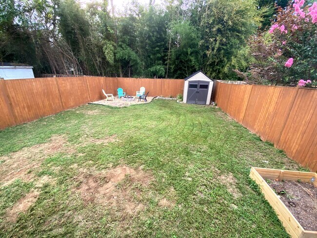 Fully fenced backbyard with firepit - 5704 Fenwick Dr