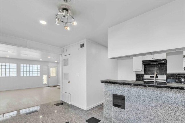 Building Photo - 5210 Woodrow Ave