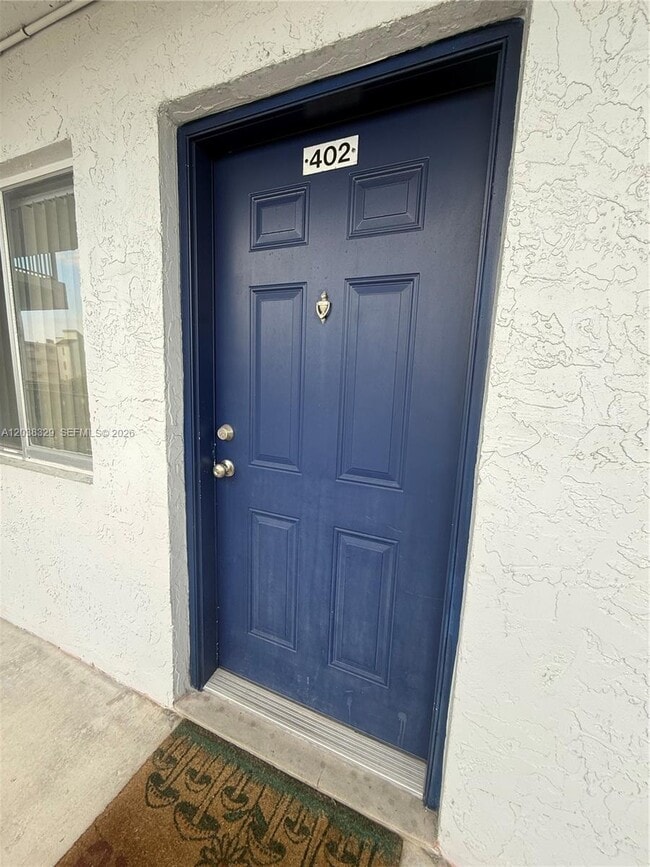 Building Photo - 8740 N Sherman Cir