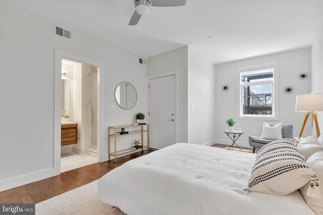 Building Photo - Sunny & Spacious NoMa penthouse with off-s...