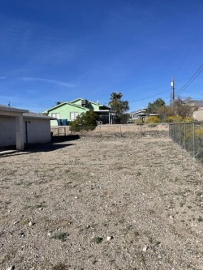 Building Photo - North side home, pet friendly with fenced back yard.