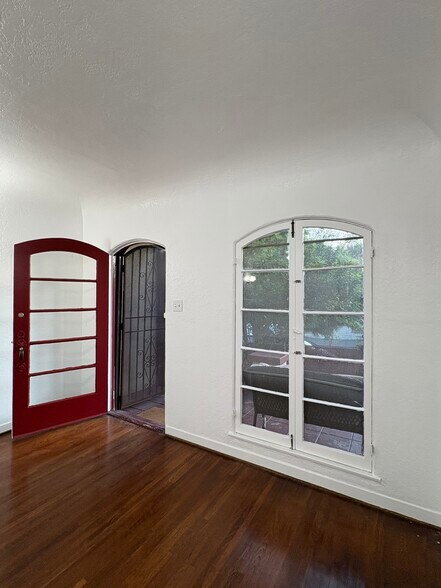 Front entry w/ arched door and French window - 782 E Kensington Rd