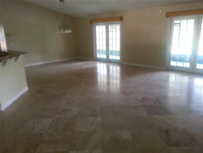 Building Photo - 9149 Palm Tree Dr
