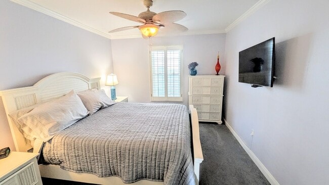 Building Photo - SEASONAL 2/2 coastal-inspired luxury condo with bay view, and boat slip