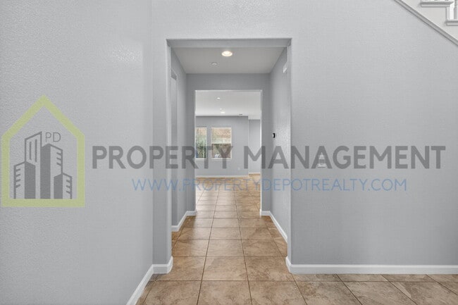 Building Photo - Spacious Elegance Awaits: 4-Bedroom Home with Hardwood Floors in Elk Grove!