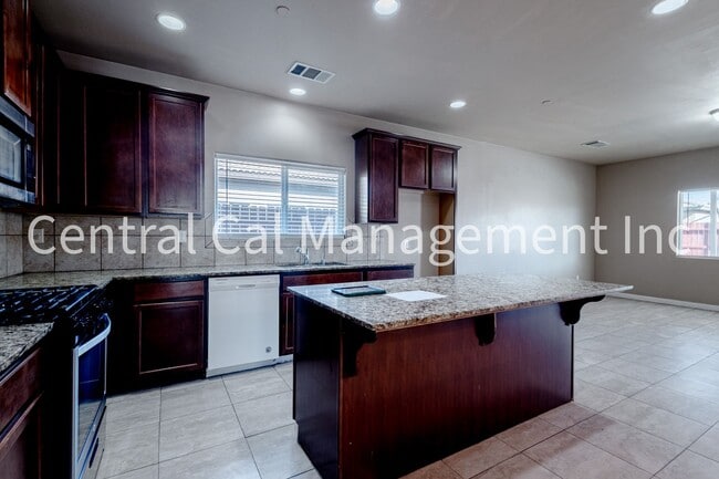 Building Photo - 4 Bedroom, 3 Bath Home in the Desired Southwest - $2595 per month!