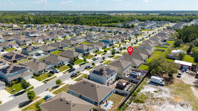 Building Photo - 4BR Under $2,300/mo | Tesla Charger | 15 Min to Lake Nona