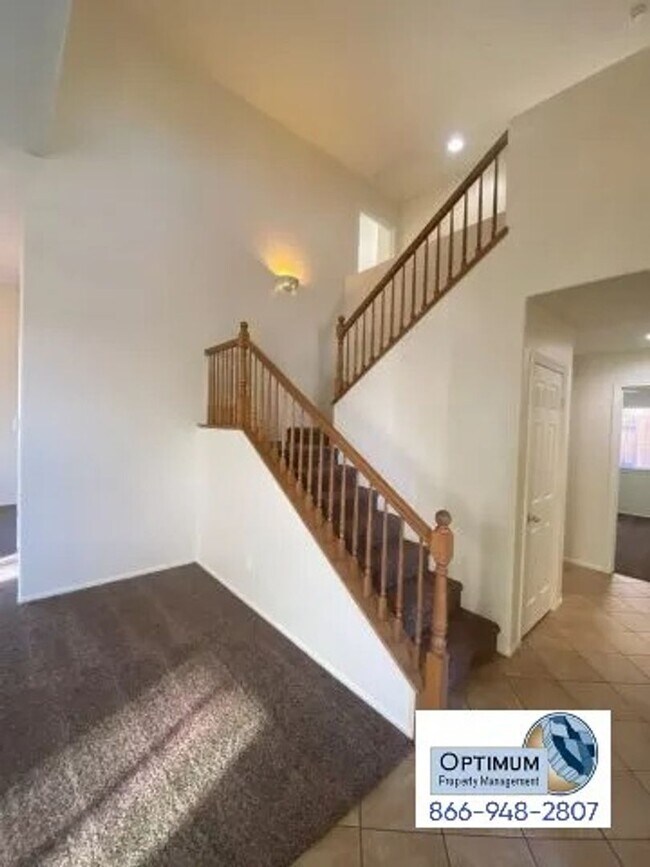 Building Photo - Spacious 4-Bedroom Home with 3-Car Garage & Downstairs Suite!