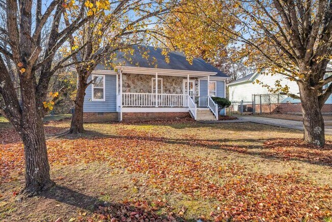 Building Photo - NE Home - Updated Kitchen and Bathrooms! SS Appliances, Fire Place, Front Porch & Deck, Fenced Yard!