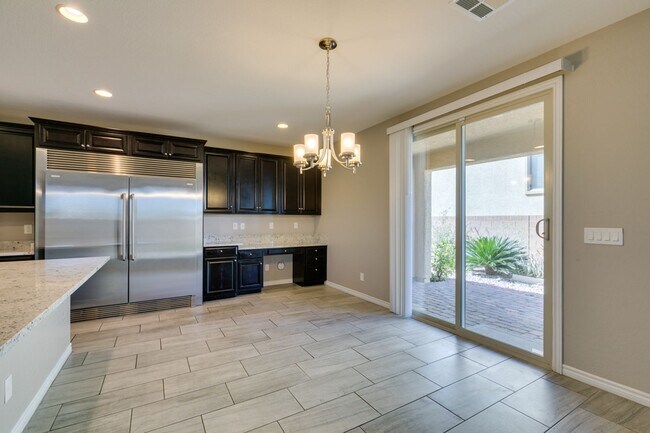 Building Photo - Beautiful Next-Gen Home with Private Entry Suite & Spacious Backyard