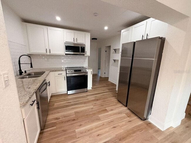 Building Photo - 4009 Deleuil Ave