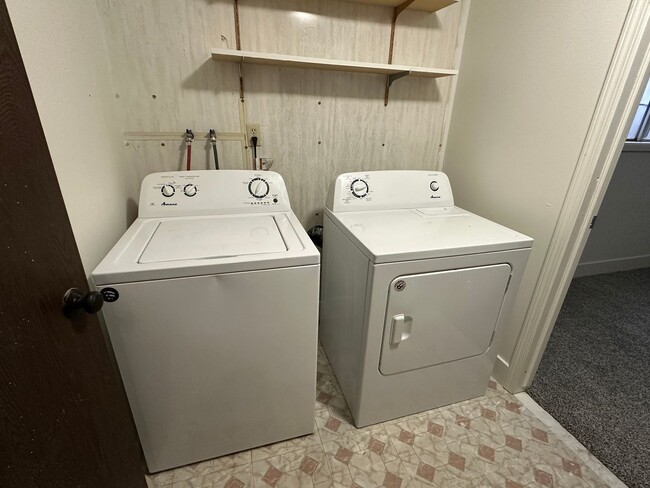 Building Photo - Spacious, three level, 4 Bed 2.5 bath Townhome in Ammon right behind the Walmart on Hitt.