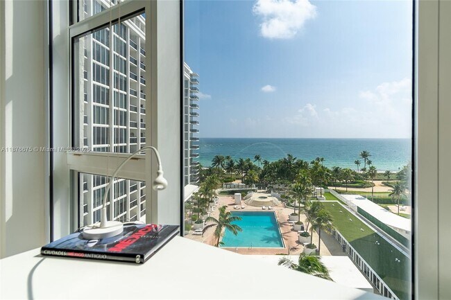 Building Photo - 10275 Collins Ave