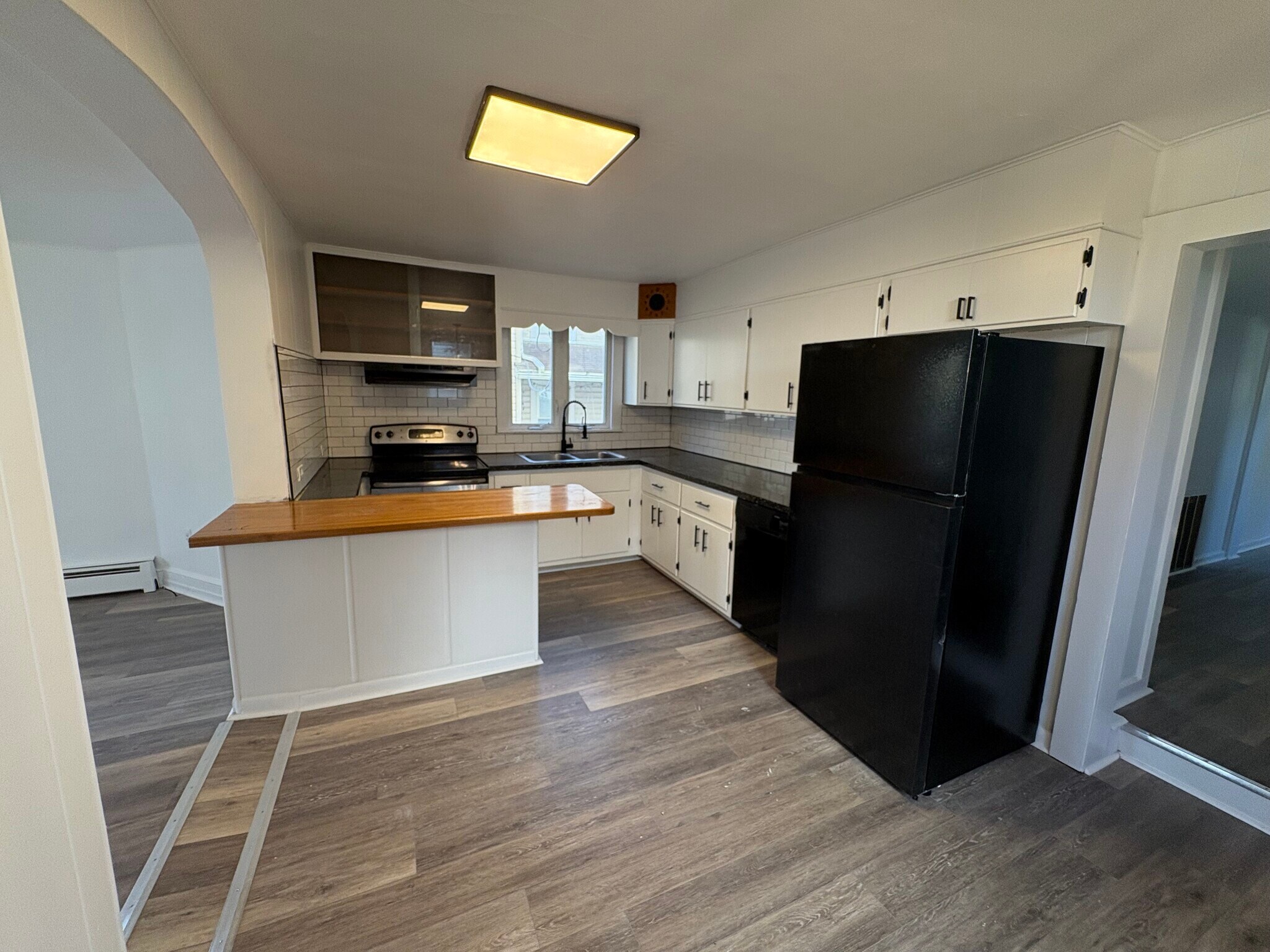 Kitchen with island and room for kitchen table - 318 N 4th St