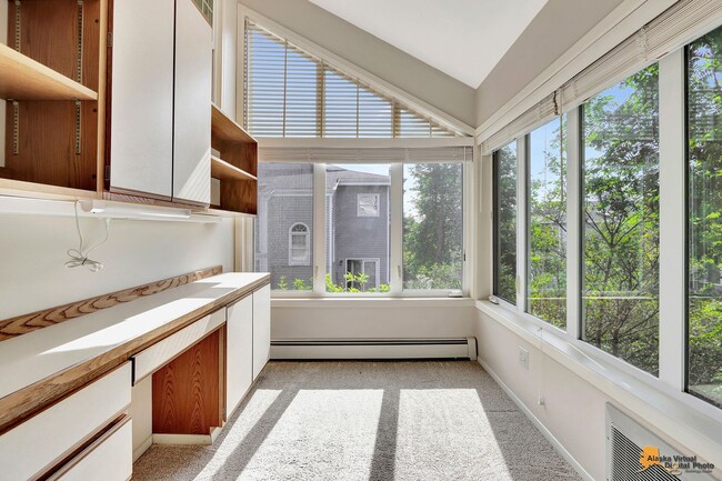 Building Photo - Spacious and bright condo located in a quiet area that boasts the perfect combination of style an...