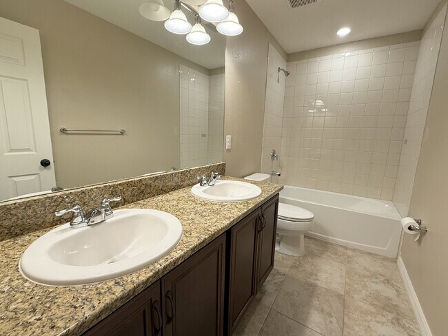 Building Photo - Spacious 4-Bedroom Retreat with additional office/den in the Heart of Trinity!