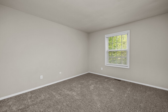 Two Bedroom Garden Partial Remodel with Fireplace | Bedroom - Woods Mill Park Apartments & Townhomes