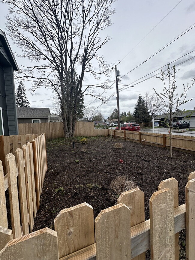 Building Photo - New 2-Bedroom Townhome with Large Front Ya...