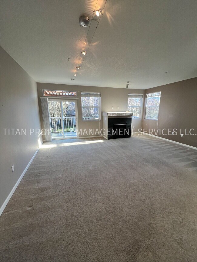 Building Photo - Beautiful Three Story Townhouse with Gas Fireplace, Balcony & 2-Car Garage