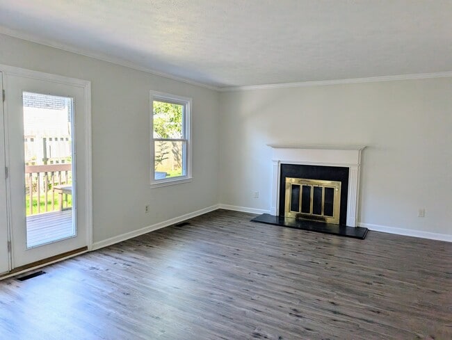 Living Room with Decorative Fireplace - 3221 Hunters Point Dr