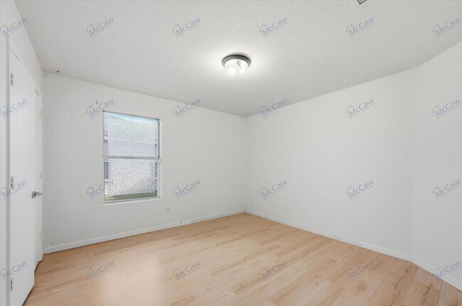 Building Photo - 8401 Swan Park Dr