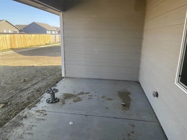 Building Photo - Single family slab home with three car garage. This home is 4 bedrooms, three bathrooms open floo...