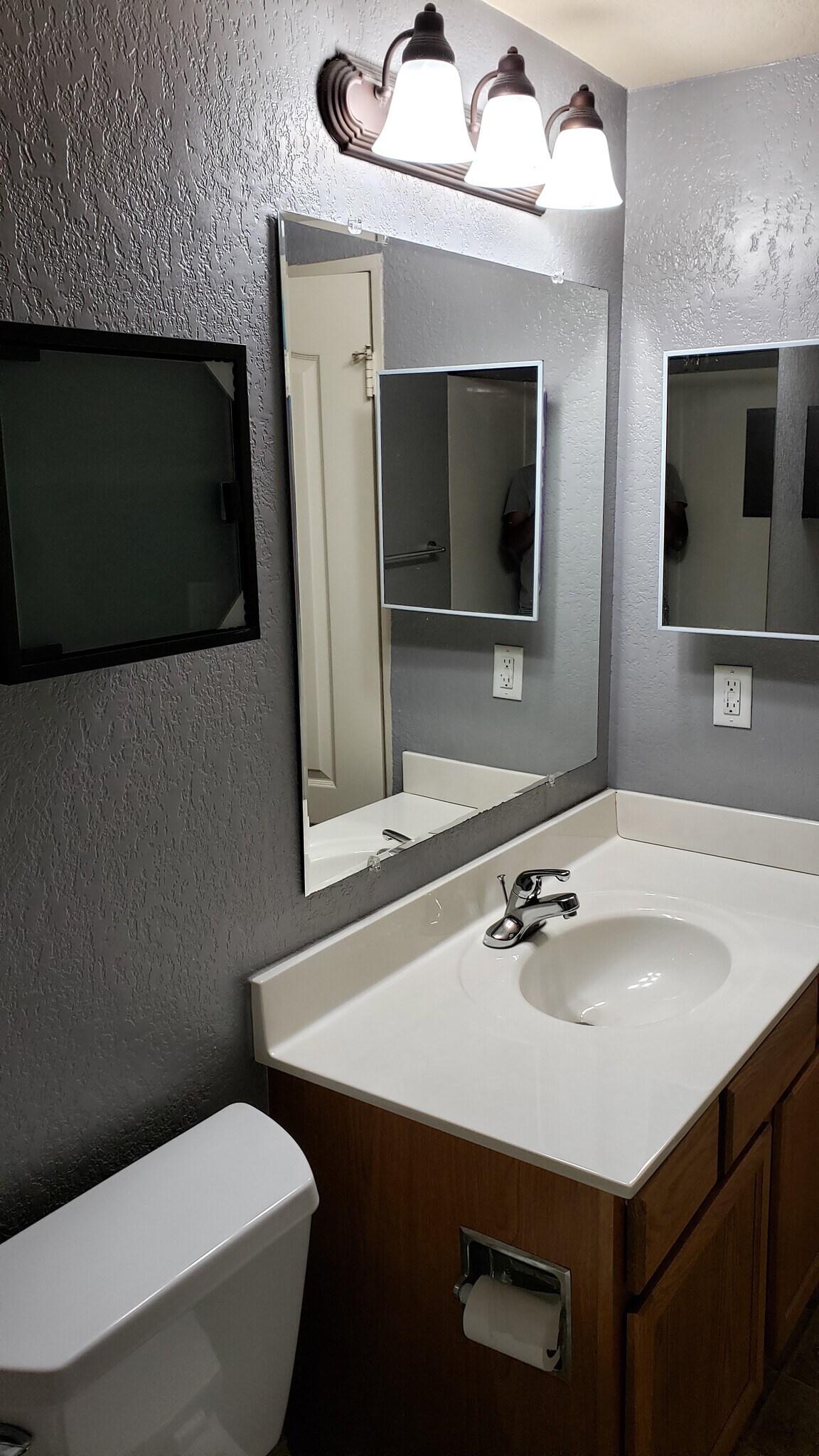 Bathroom, good storage in vanity, medicine cabinet, and square thing above toilet. - 500 Grandview Ct.