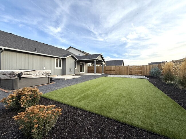 Building Photo - TAKE A LOOK A THIS GORGEOUS HOME NESTLED I...