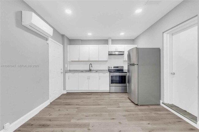 Building Photo - 6940 NW 6th Ct