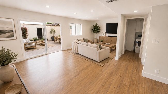 Building Photo - Fully Renovated 3 Bed Townhome with Large Enclosed Patio + 2-Car Garage
