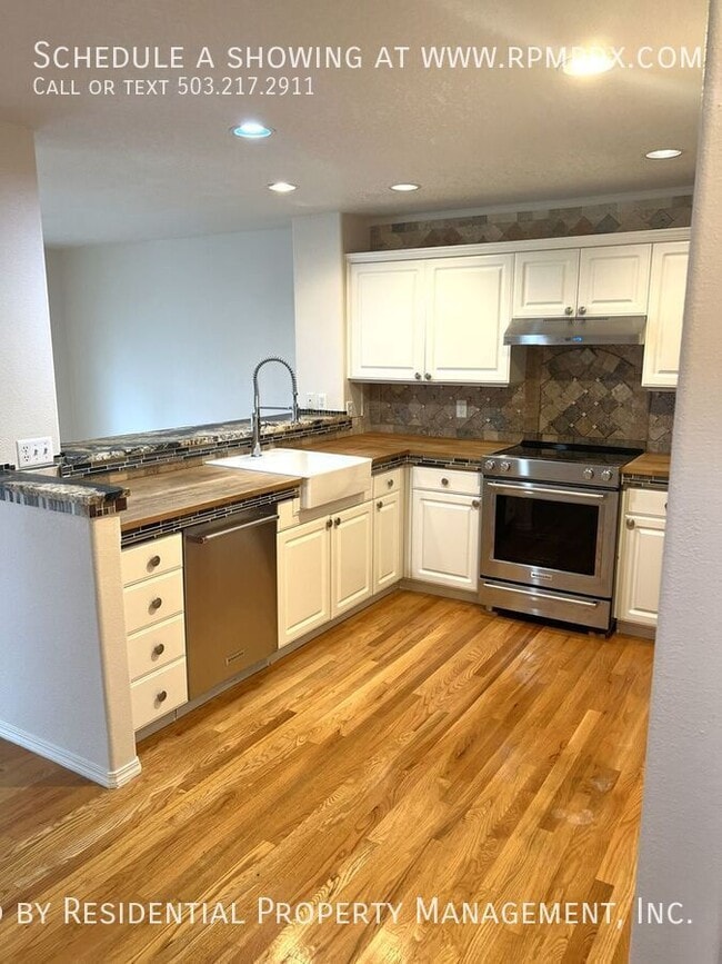 Building Photo - 6463 NW Wenmarie Dr