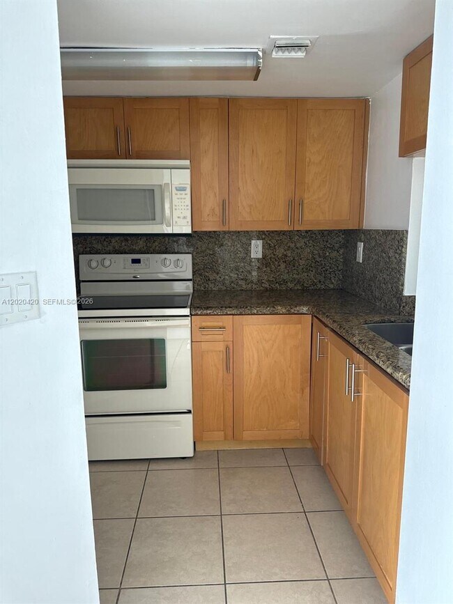 Building Photo - 8275 SW 152nd Ave