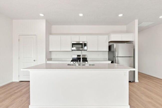 Building Photo - Modern 4-Bedroom Home with a 3-Car Garage & Covered Patio