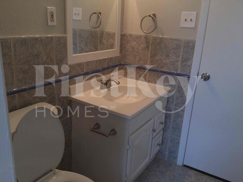 Building Photo - 6318 Songwood Dr