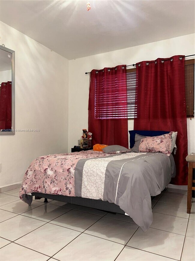 Building Photo - 5891 W 9th Ln