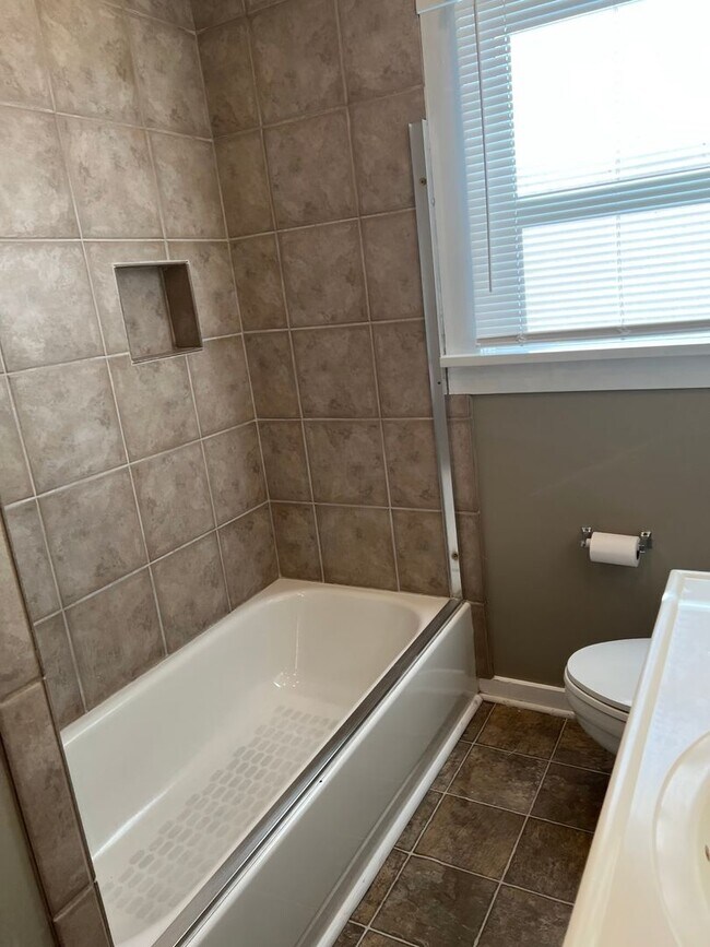 Building Photo - Fenced Yard - Laminate Flooring - Mid-Town - Extra Outside Storage