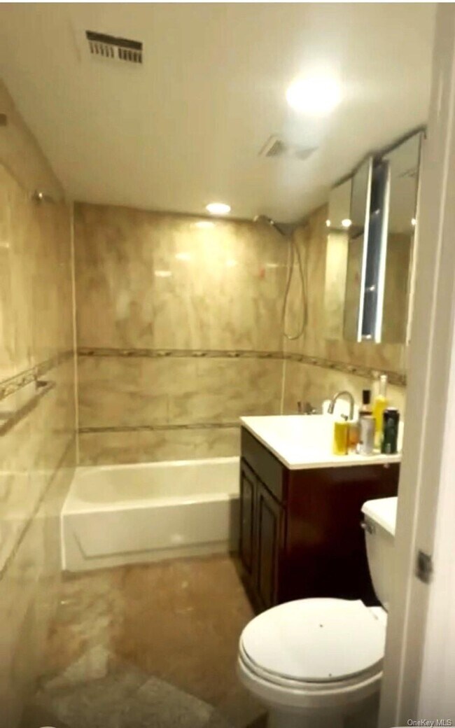 Building Photo - 104-27 38th Ave