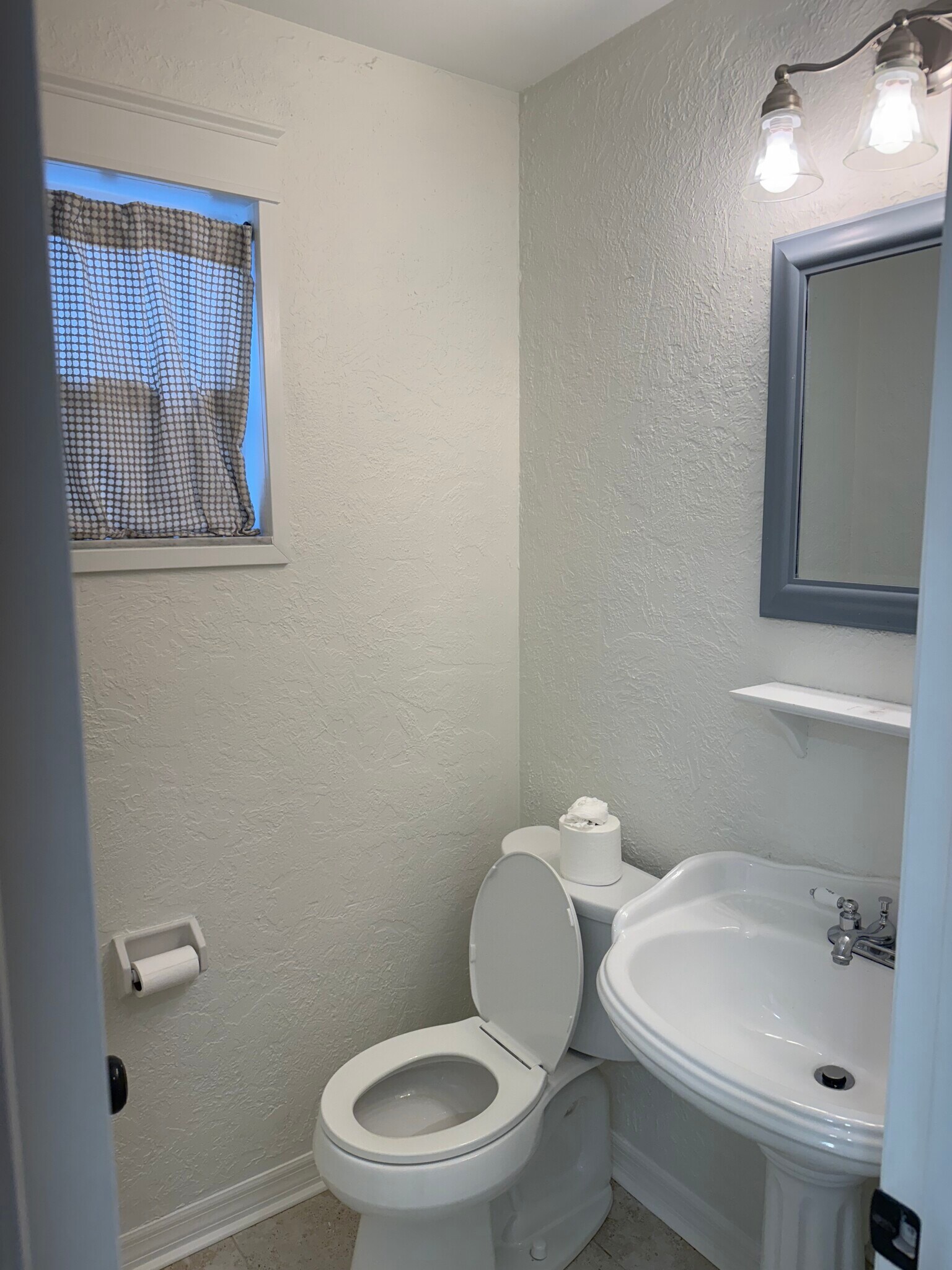 Half bath near Kitchen/Garage - 3601 W Santiago St