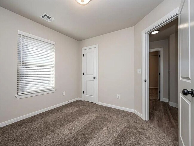 Building Photo - 4-Bed Home with Storm Shelter & 2-Car Garage in Mustang