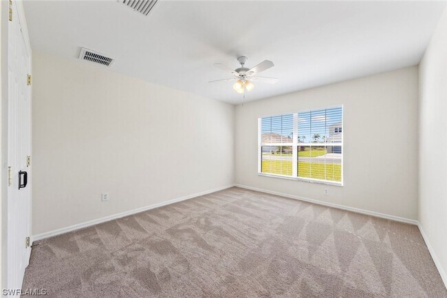 Building Photo - 4BR Home in Gated Town Lakes Community with Lake View
